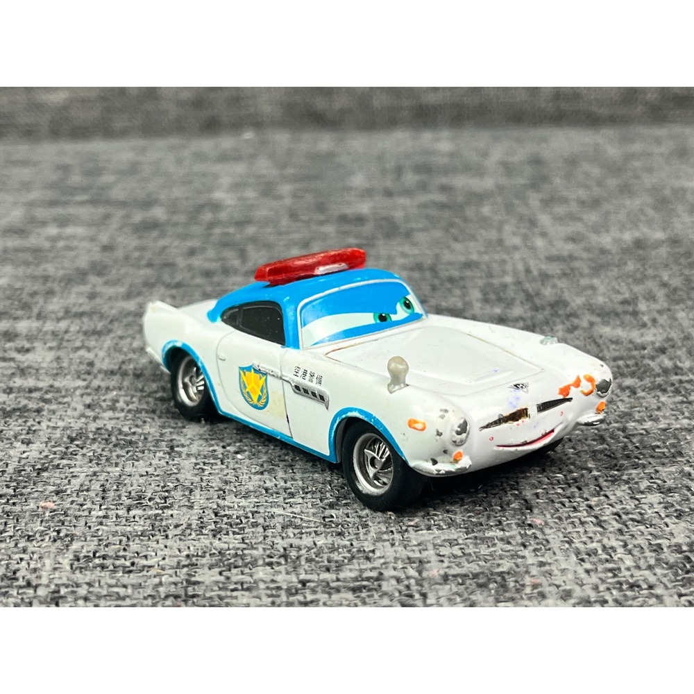 Mattel Disney Pixar Cars 2 Finn McMissile Japanese Airport Security Police V8884